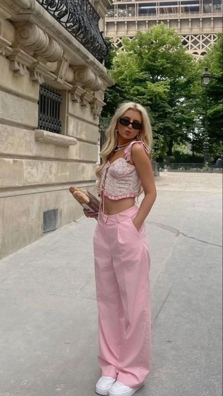 Pink Wide-Leg Pants and white Sneakers